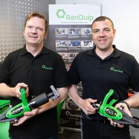 John Morgan and Marc Gerrard stand with a Viper-28 and Viper-28p Flange Spreaders